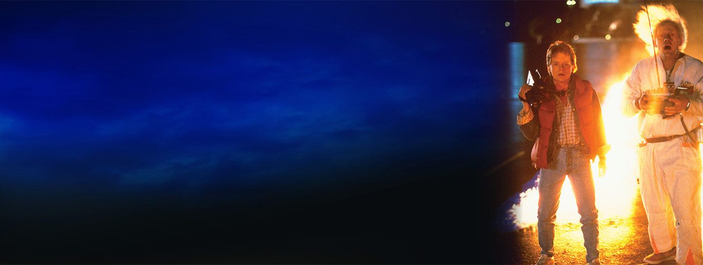 A cup of frozen yogurt alongside a slice of apple pie with caramel sauce.